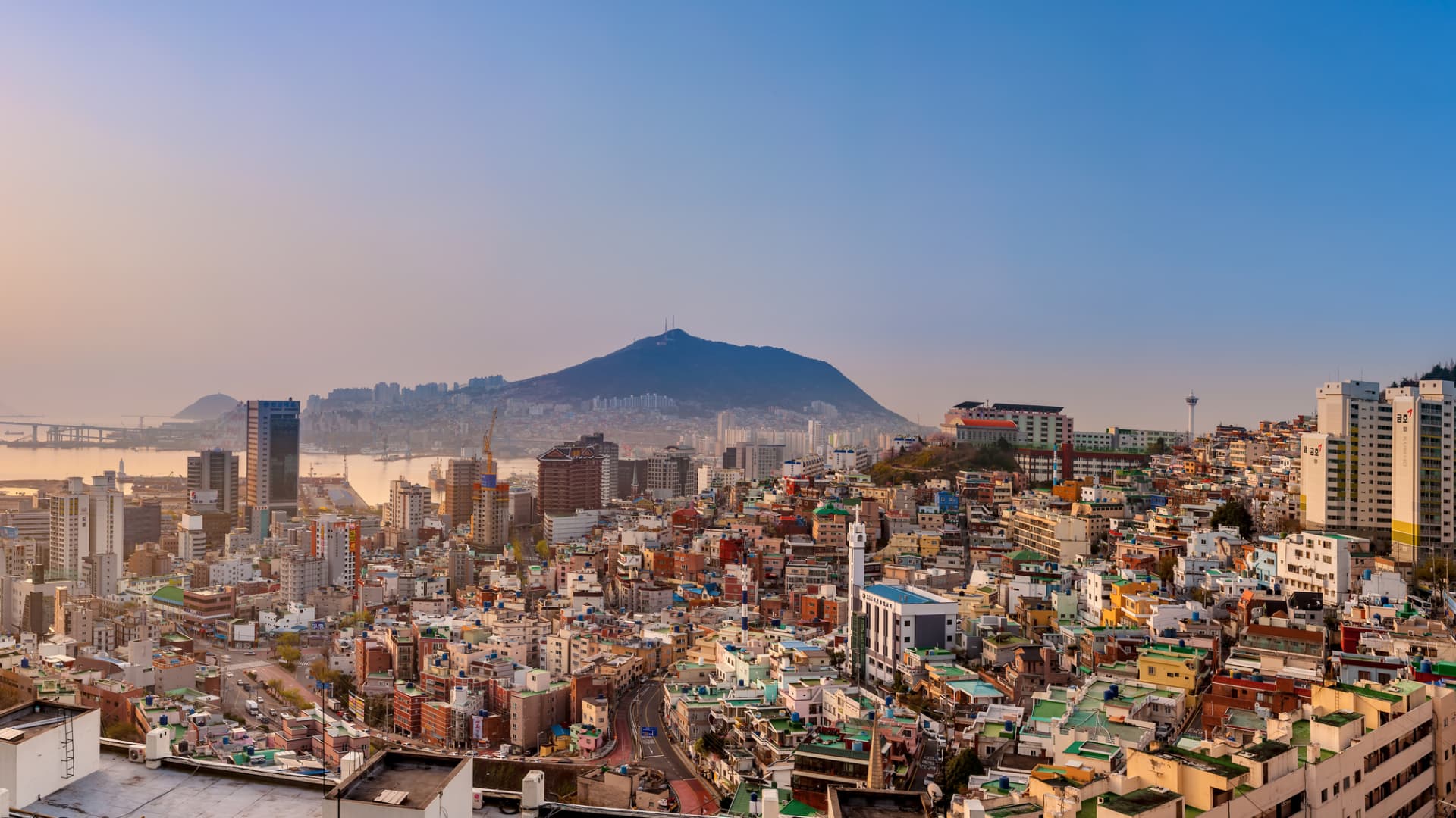 108223408-1762746947074-gettyimages-949983300-sunrise-busan-panorama.jpeg