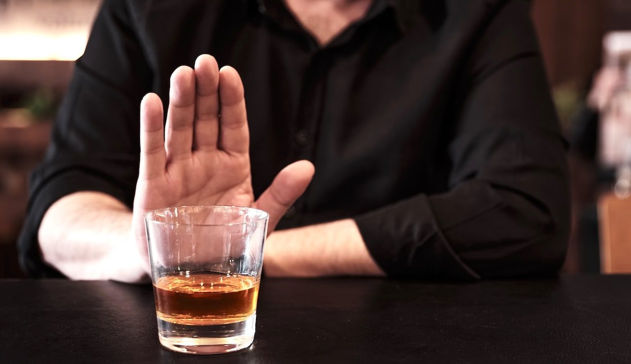 man-abstaining-from-drinking.jpg