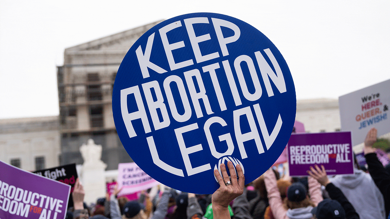 supreme-court-keep-abortion-legal-sign.gif