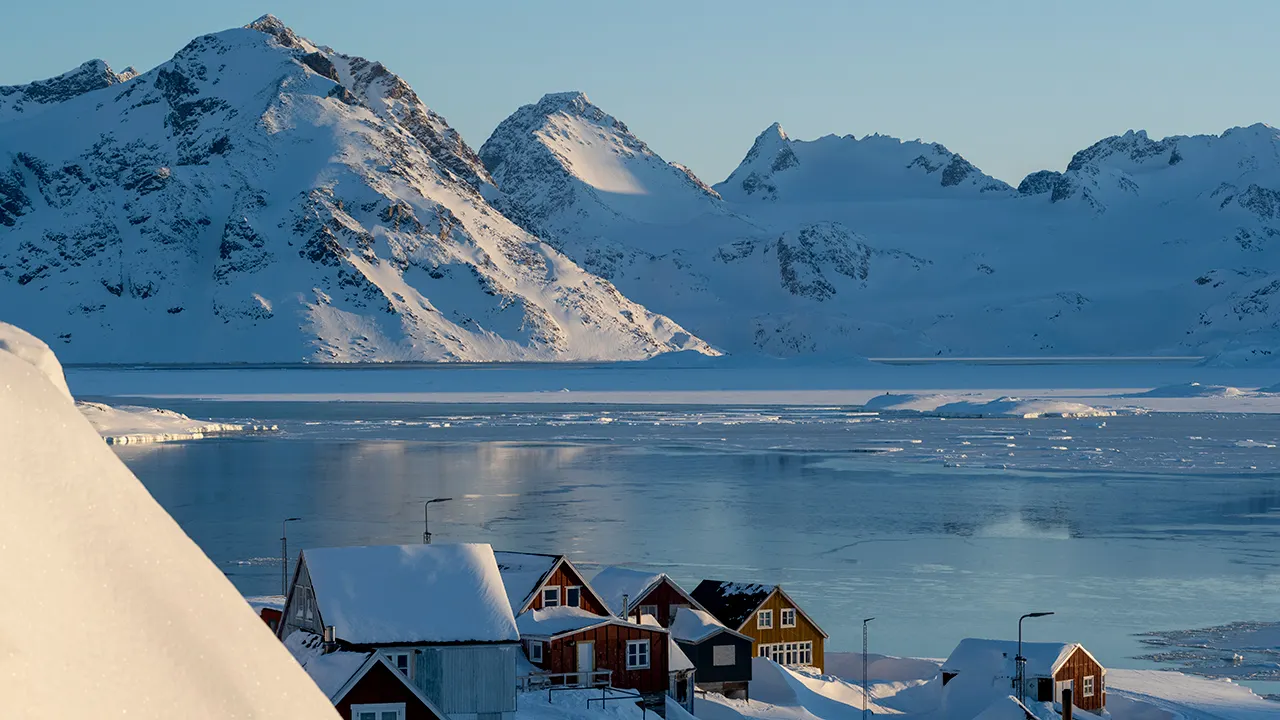 frozen-bay-and-mountains-greenland.jpg