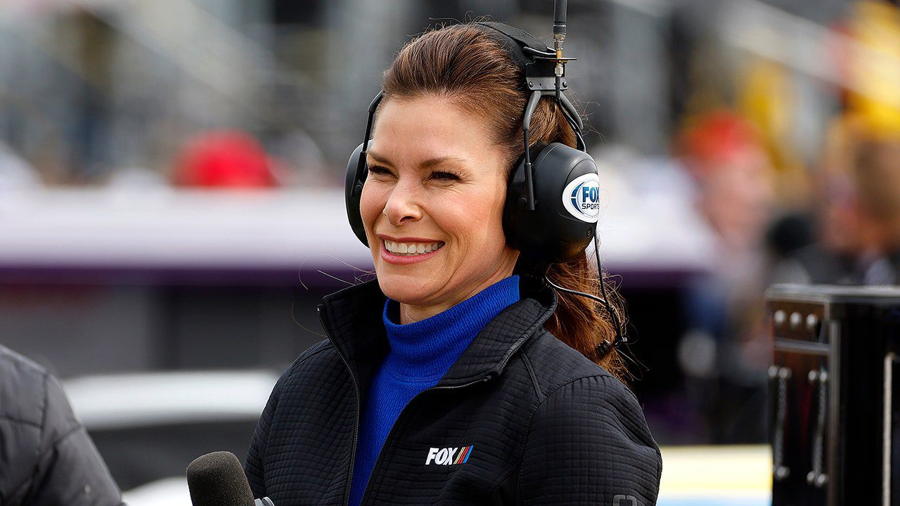 jamie-little-smiles-nascar-track.jpg