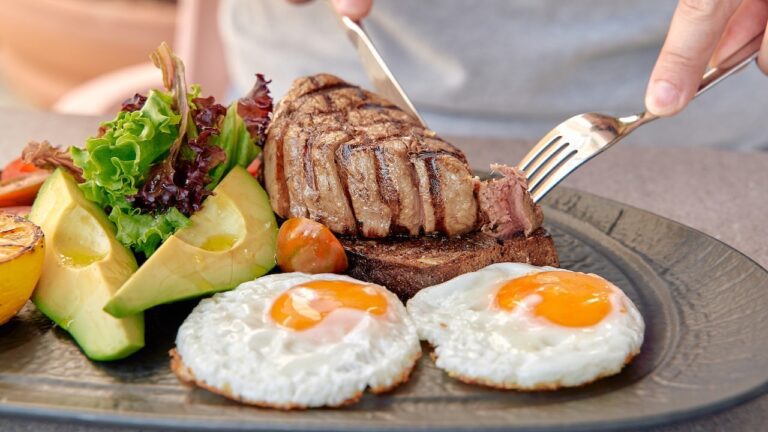 person-eating-steak-and-eggs.jpg