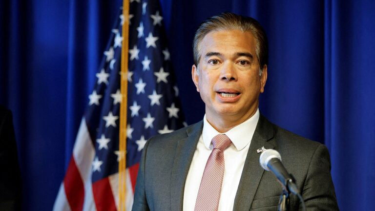 rob-bonta-speaking-in-front-of-american-flag.jpg