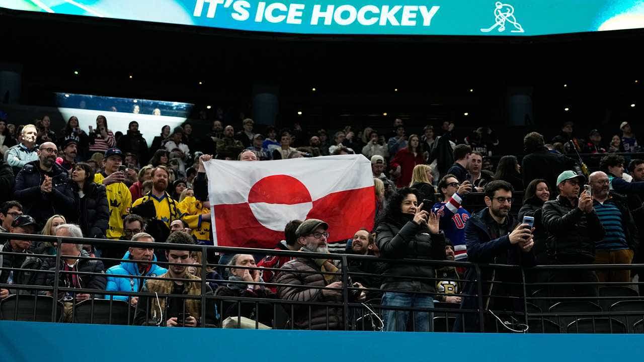 spectators-hold-greenland-flag-at-winter-olympics.jpg