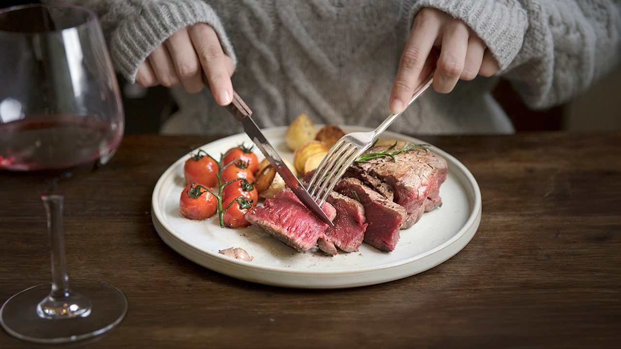 eating-red-meat-with-knife-and-fork-2.jpg