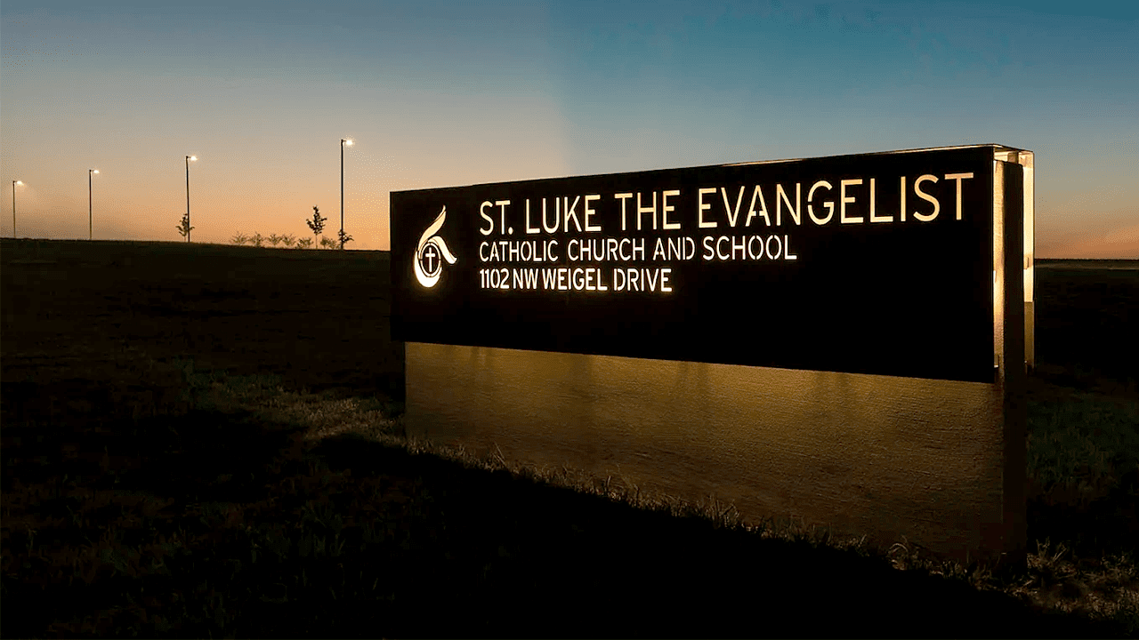 st-luke-school-sign-car-hits-students.png