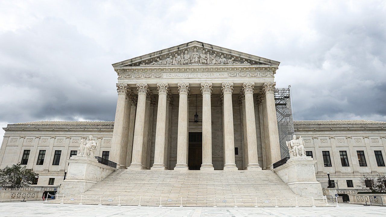supreme-court-facade-clouds.jpg