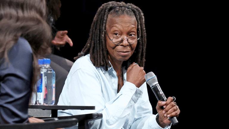 whoopi-goldberg-speaks-on-stage.png