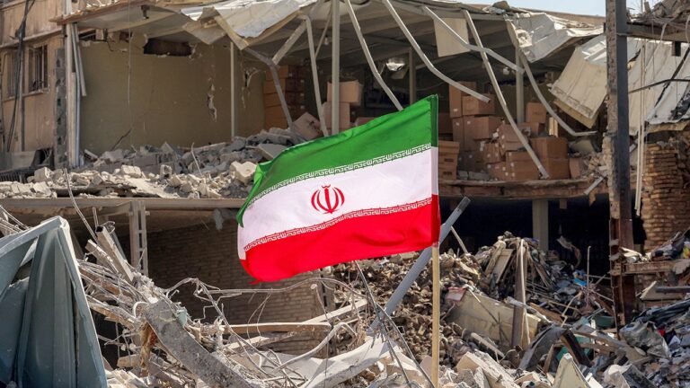iran-flag-rubble-march-2026.jpg