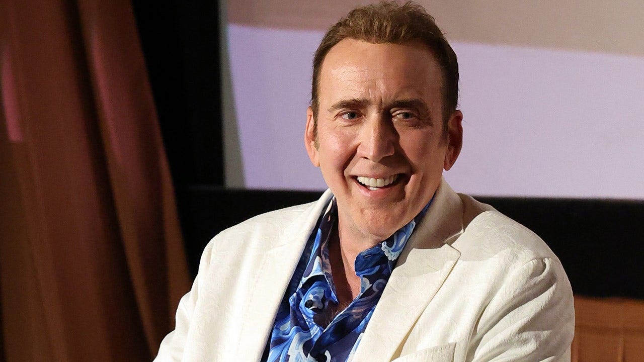 nicolas-cage-white-suit.jpeg