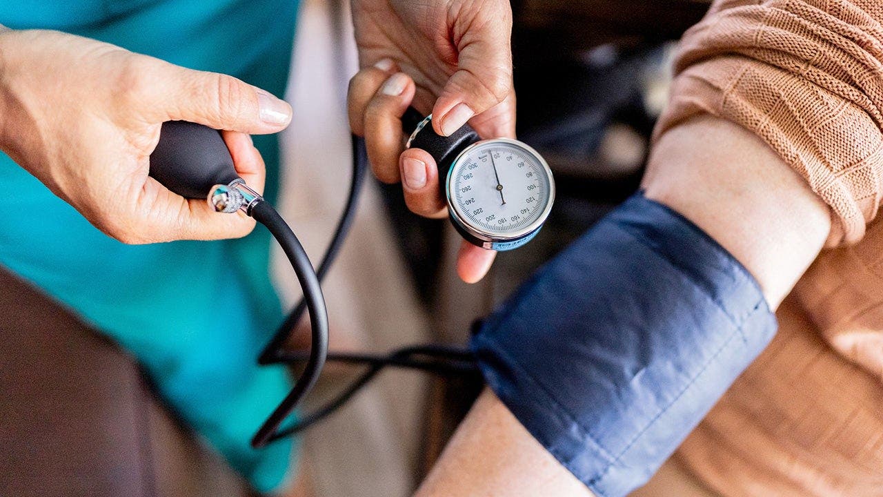 person_testing_blood_pressure.jpeg
