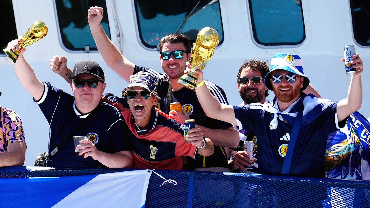 scotland-fans-on-boat.jpeg
