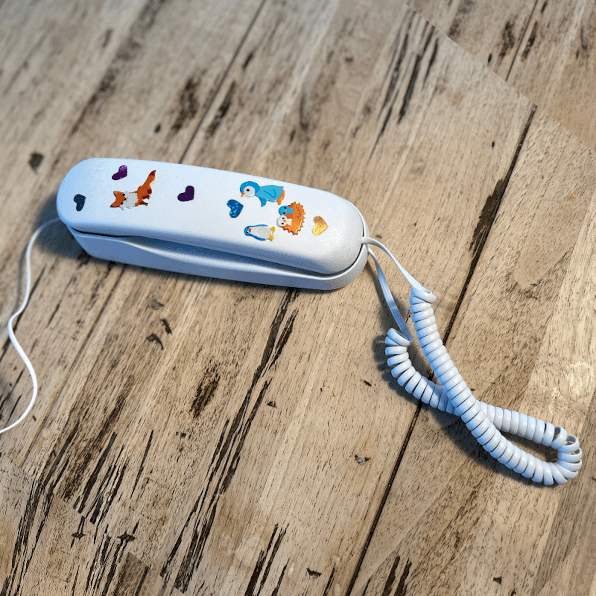 Pinwheel-Home_Classic_White-w-Stickers-on-Table.png