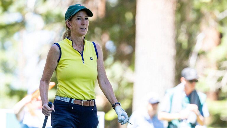 WNBA-Commissioner-golfing.jpg