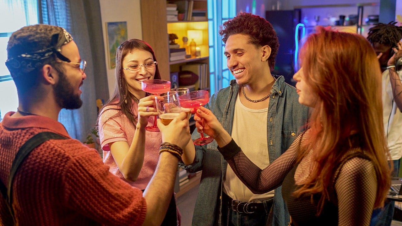 friends-drinking-cocktails-home-party.jpg