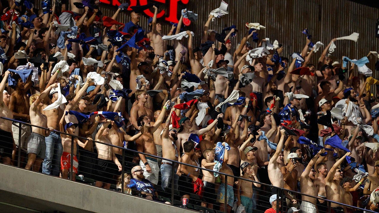 shirtless-fans-cheer-rangers-angels.jpg