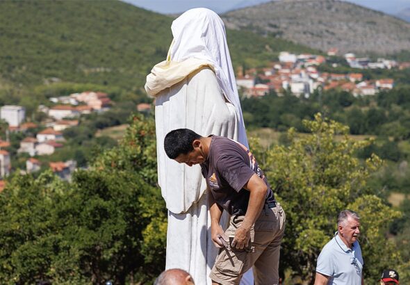 vandalized-statue-virgin-mary.jpg