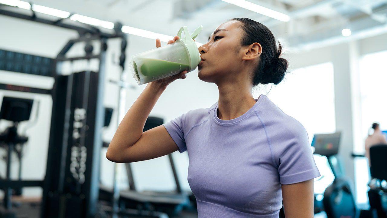 woman-drinks-creatine-gym.jpg