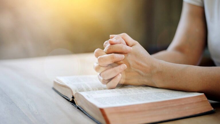 woman-praying-bible-fox-news-001.jpeg
