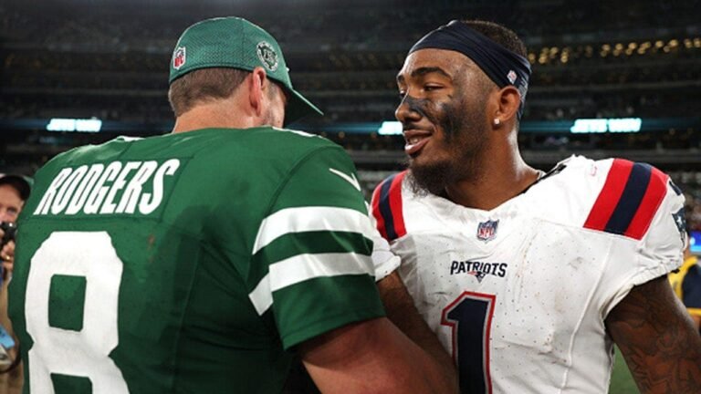 aaron-rodgers-ja-lynn-polk-metlife-stadium.jpg