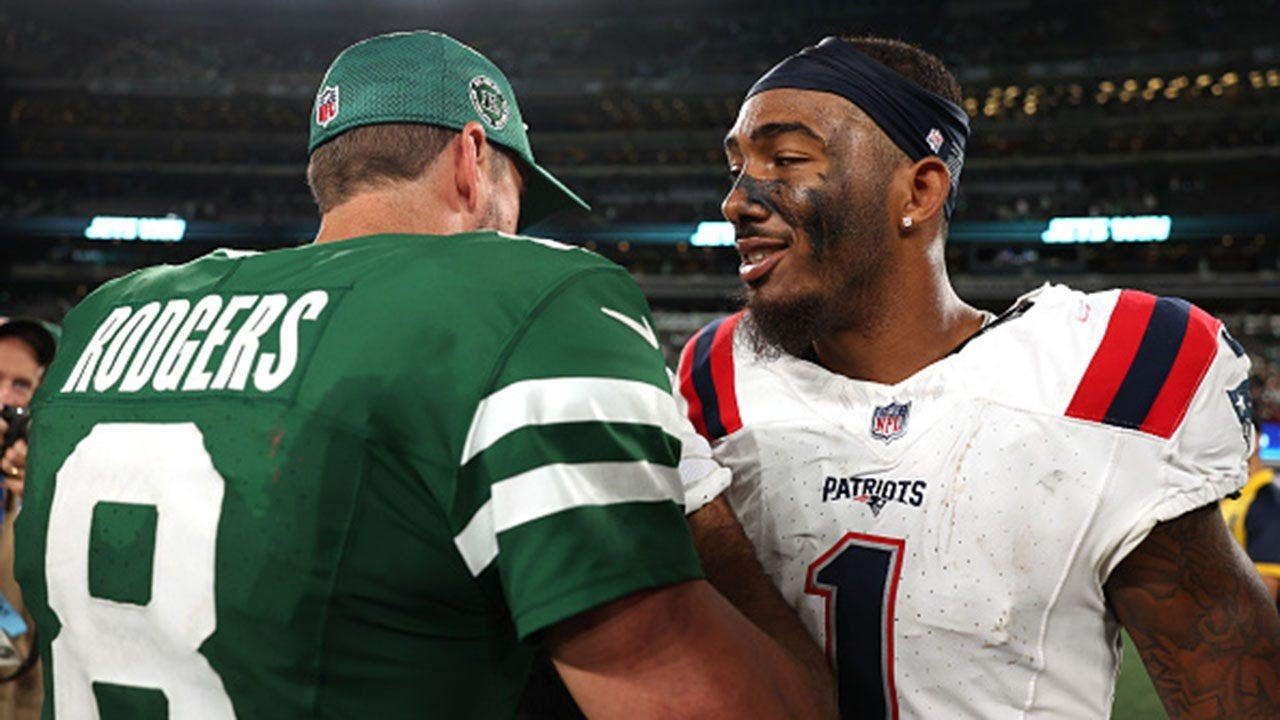 aaron-rodgers-ja-lynn-polk-metlife-stadium.jpg