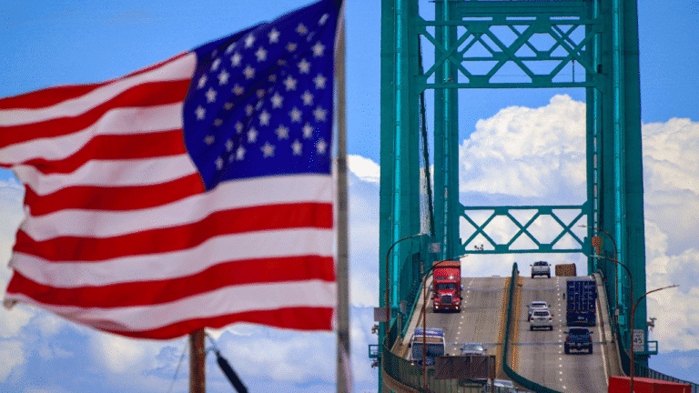 american-flag-semi-trucks-highway.png