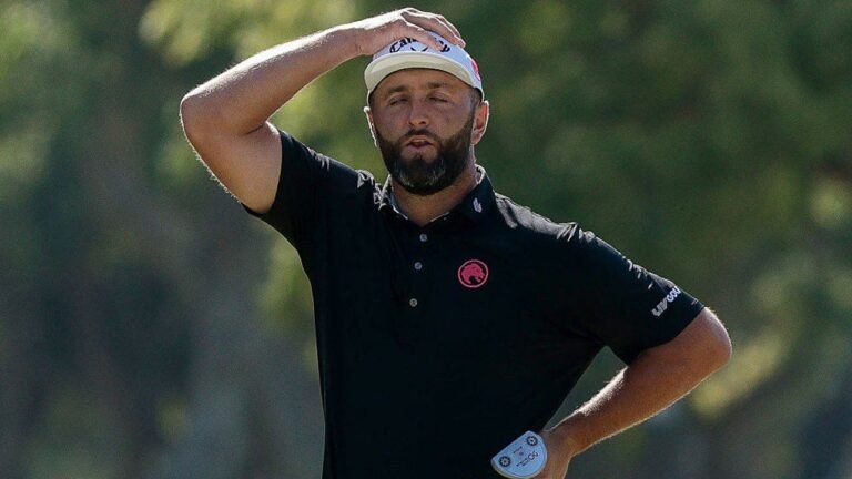 jon-rahm-hand-on-head.jpeg