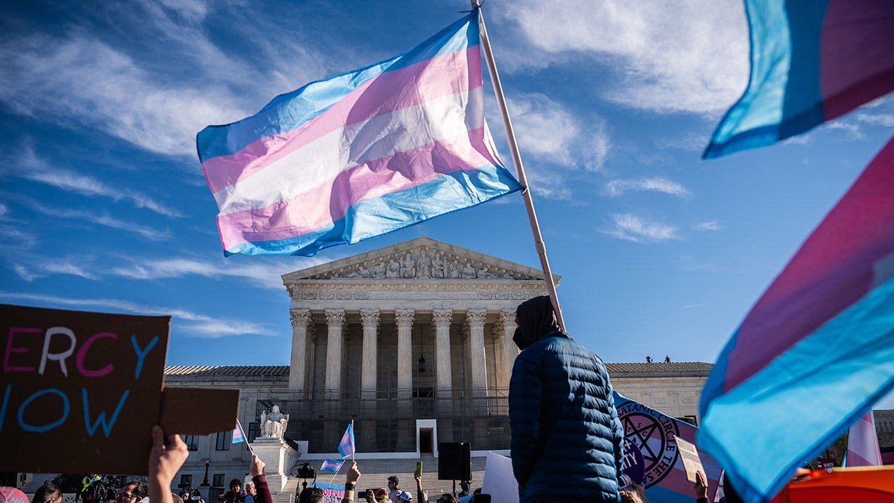 protest-flags-supreme-court-transgender-athletes-002.jpg