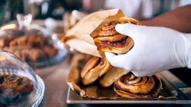 cinnamon-roll-in-hand.jpg