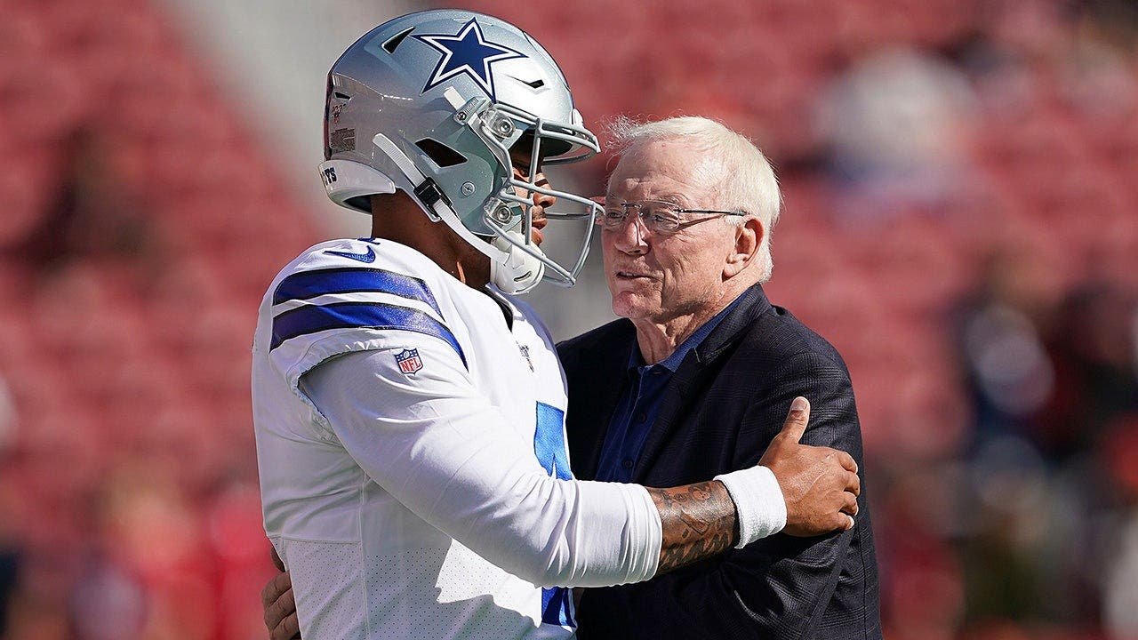 dak-prescott-jerry-jones-hug-levi-stadium.jpg