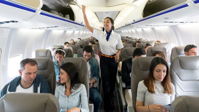 flight-attendant-airplane-aisle.jpg