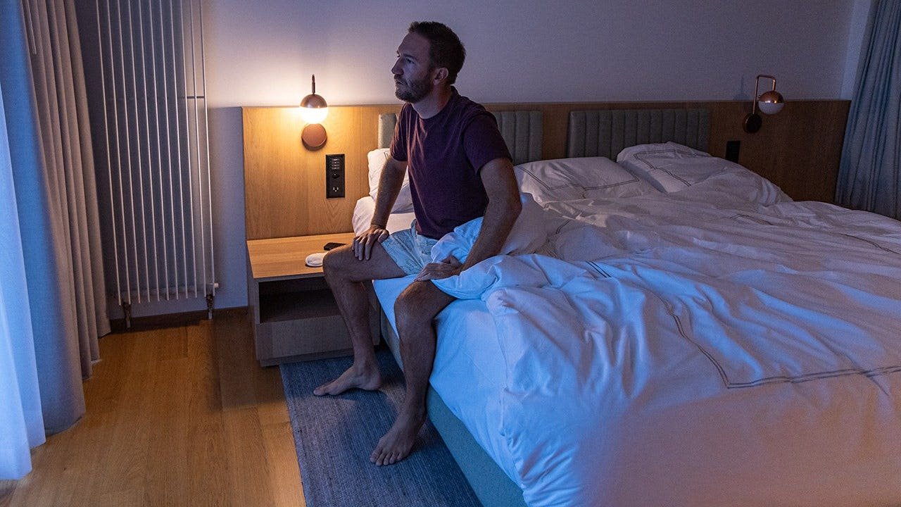 man-waking-up-sleep-bed.jpg