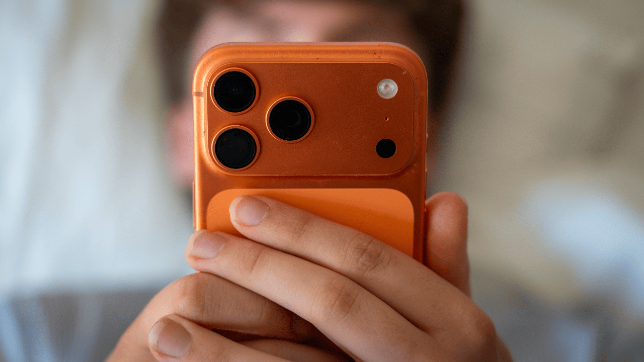 teen-using-iphone-stock.png