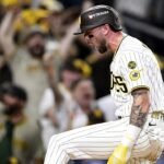 jackson-merrill-celebrates-scoring-padres-nlds.jpg