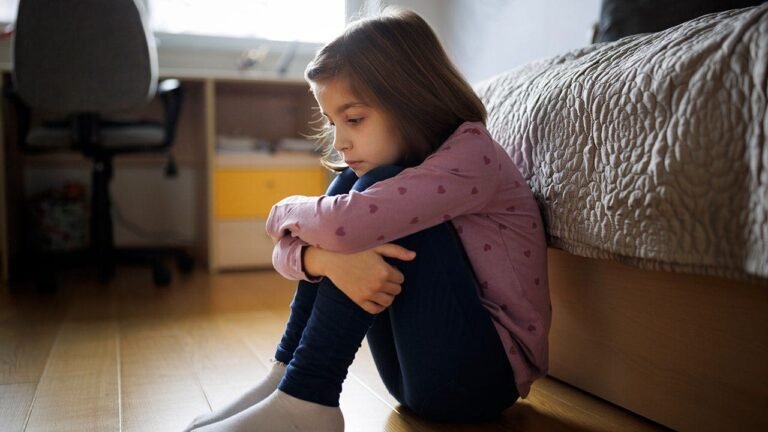 little-girl-sitting-alone.jpeg