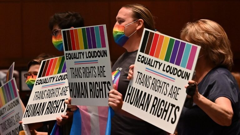 loudoun-county-parents-holding-signs.jpg