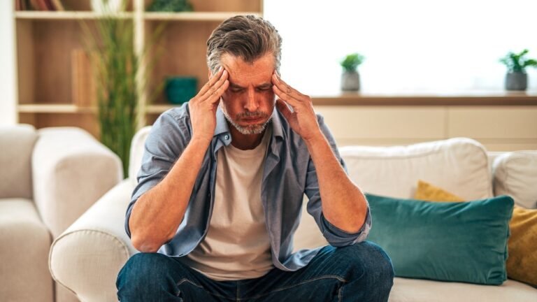 man-with-headache-overwhelmed.jpg