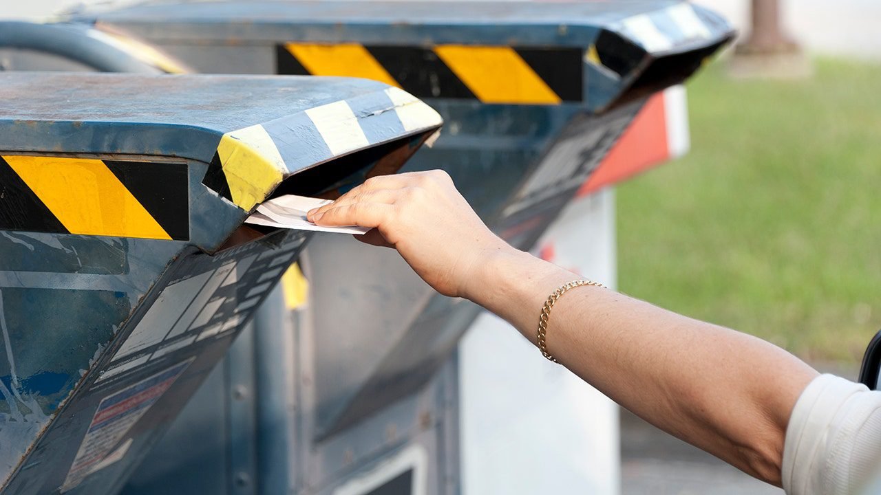 woman-sending-mail.jpg