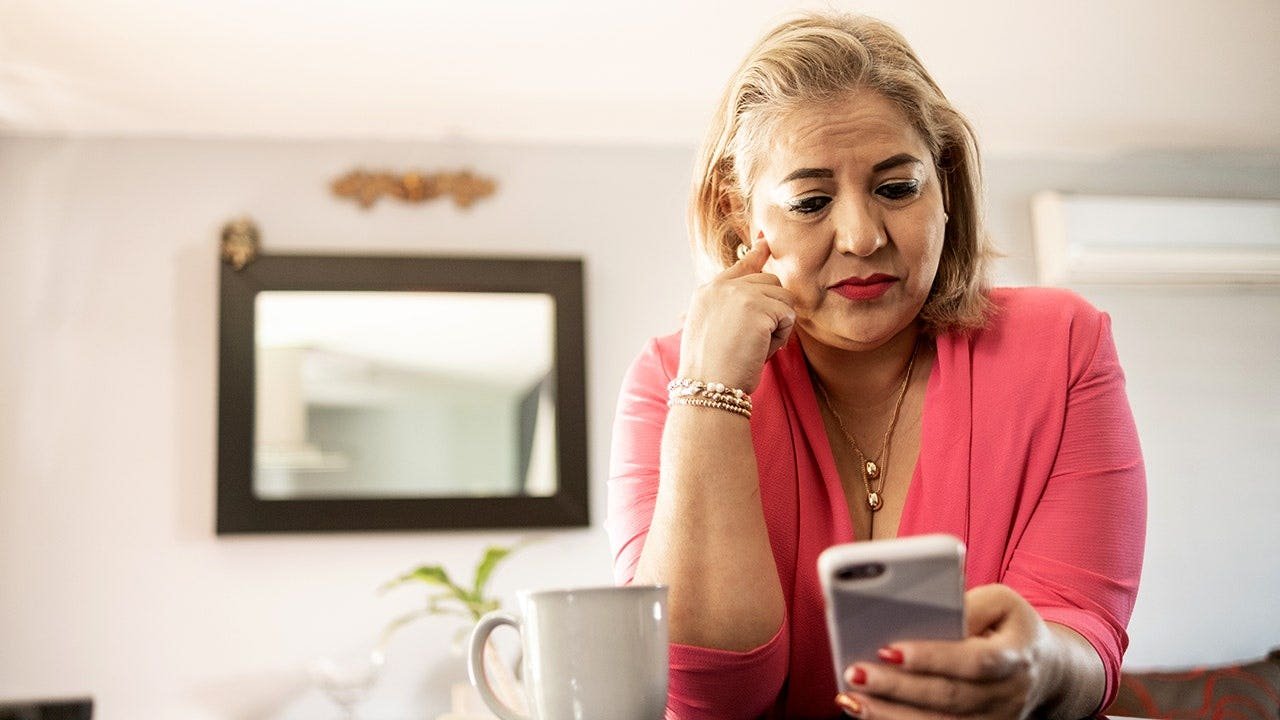 woman-uses-smartphone.jpg